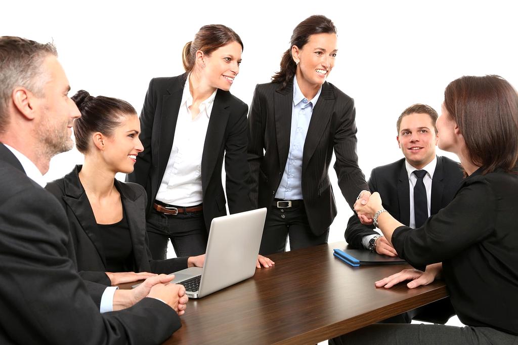 Team of professionals reviewing business documents